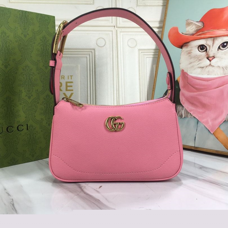 G*u*i top handle bags